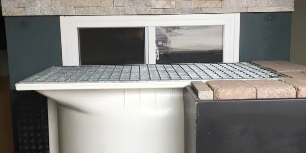 window well installed from bottom
